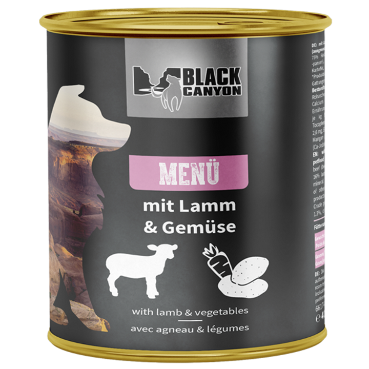 Can of Black Canyon pet food with lamb and vegetable label on a white background