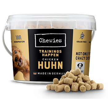 Chewies dog treats in a container with treats spilling out on a white background