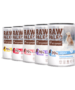 Multiple cans of Raw & Paleo pet food on a light gray background