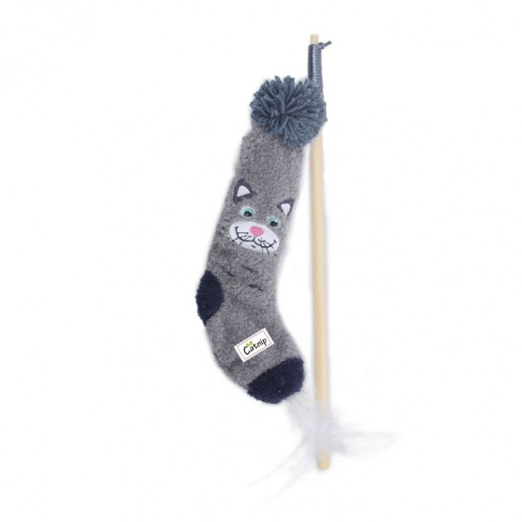 Gray cat-shaped sock with a pom-pom and a wand on a white background