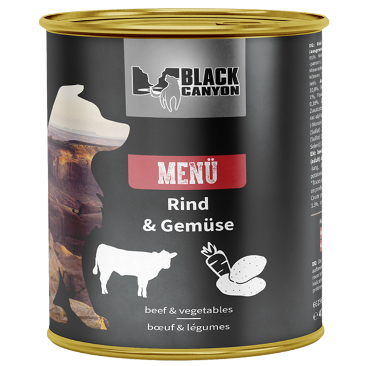 a can of dog food black canyon menu with beef and vegetables

