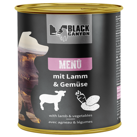 Can of Black Canyon pet food with lamb and vegetable label on a white background