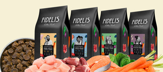 picture with bags of air dried dog food from brand fidelis and with infredients that are used in that food