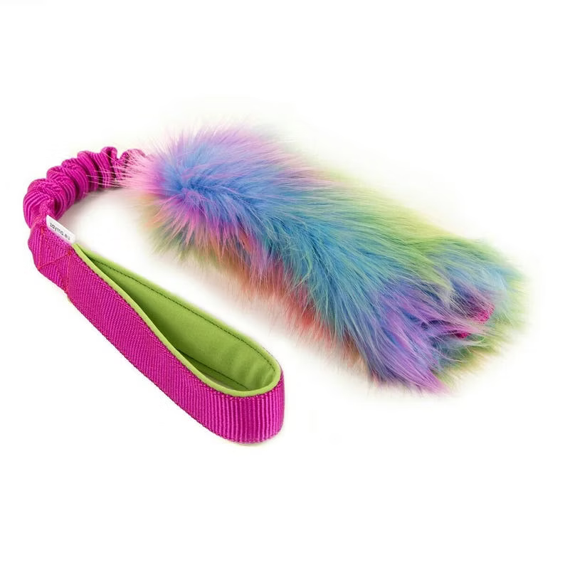 photo of a dog tug o war toy with rainbox colored faux fur