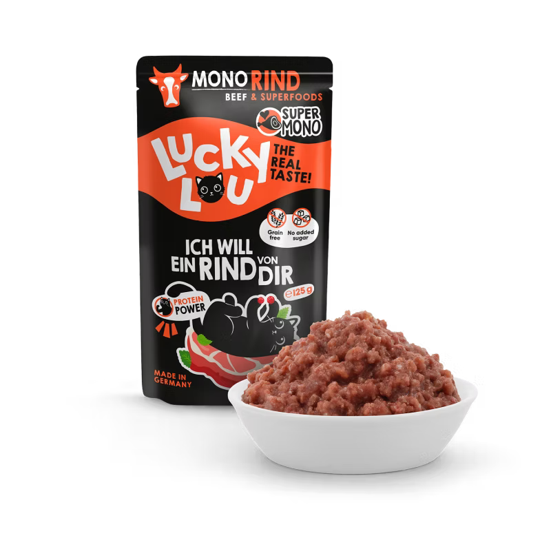 a pouch of lucky lou cat food with beef on black background