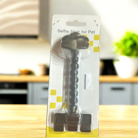 Pet selfie stick in packaging on a kitchen counter