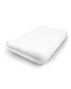 White folded towel on a white background