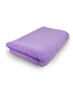Folded purple towel on a white background