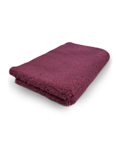Folded purple towel on a white background