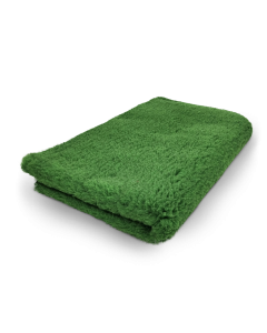 Folded green towel on a white background