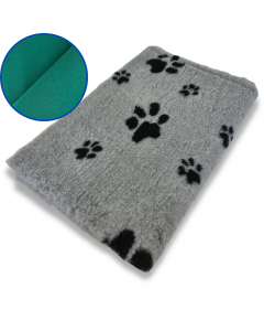 Gray mat with black paw prints and a close-up of a paw print in green on a white background
