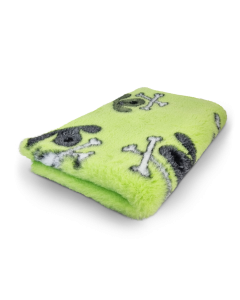 Folded green towel with black and white designs on a white background
